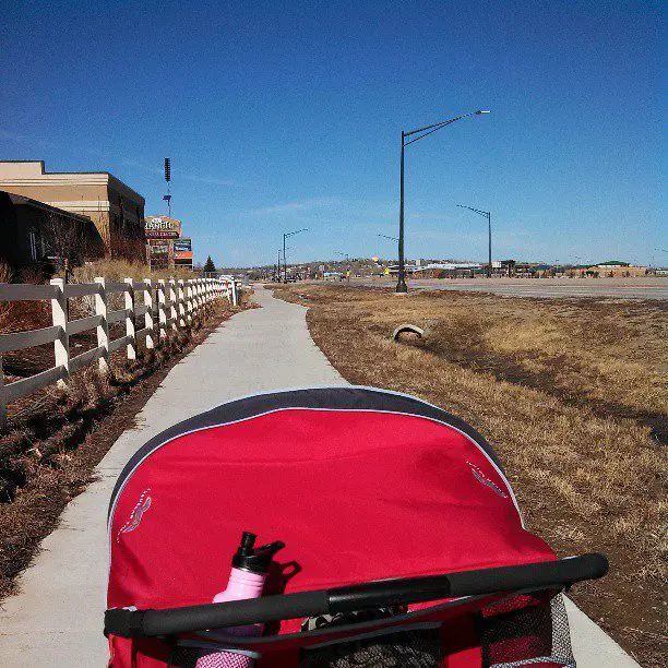 Double stroller fits sidewalk with ease.