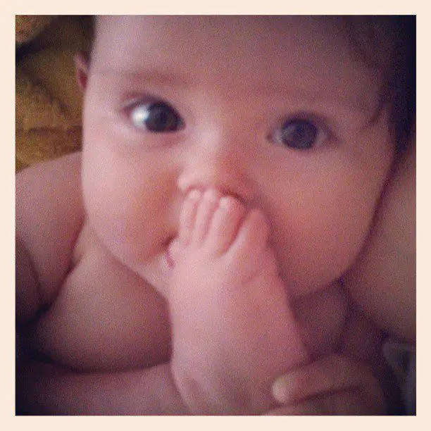 Baby prefers toes over nursing.