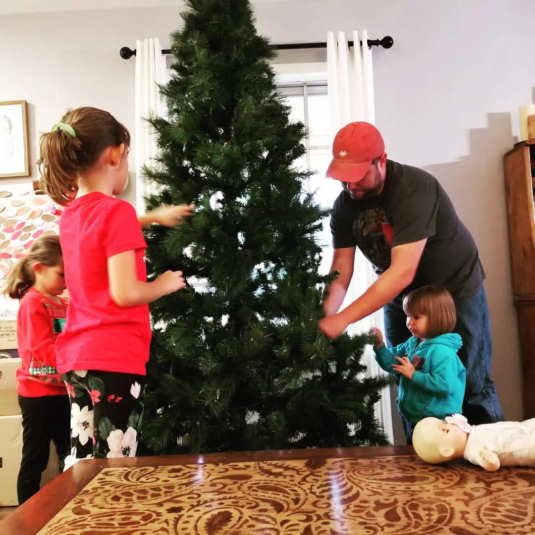 Supervising Tree Decorating from the Couch.