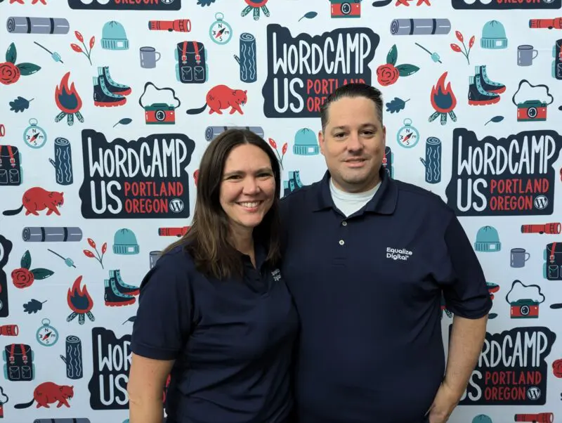 Amber and Steve wearing Equalize Digital polos in front of a WordCamp US 2024 backdrop.