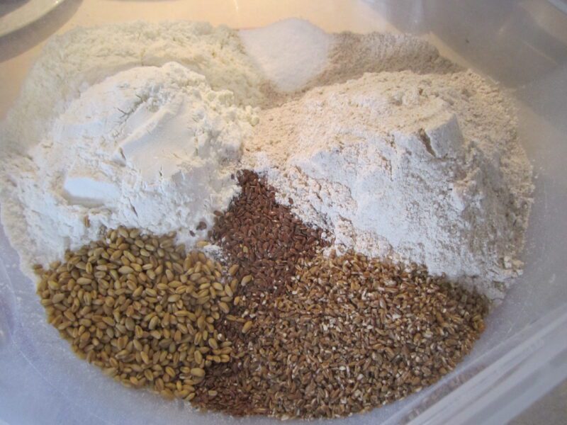 grains and flour poured into a bowl