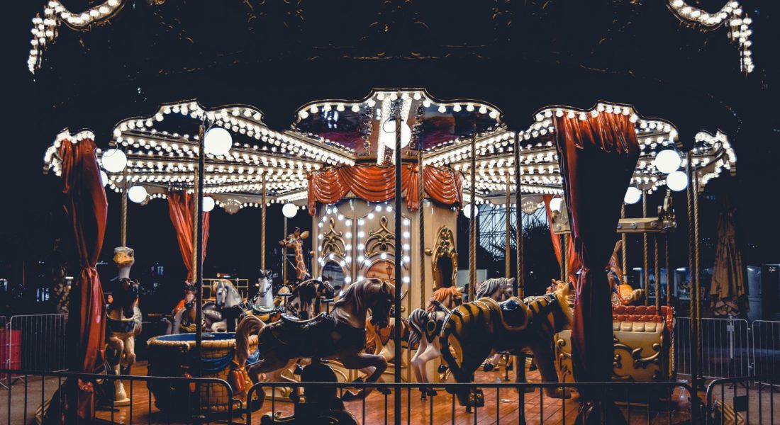 small carousel lit up at night
