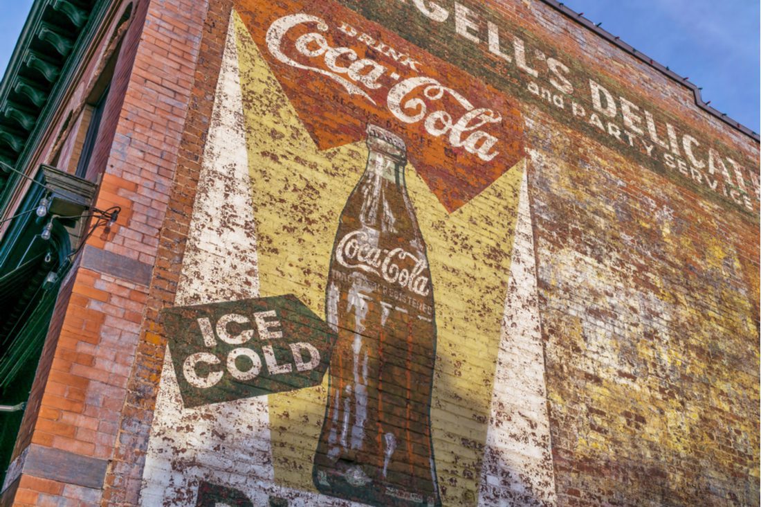 old coca-cola sign painted on building